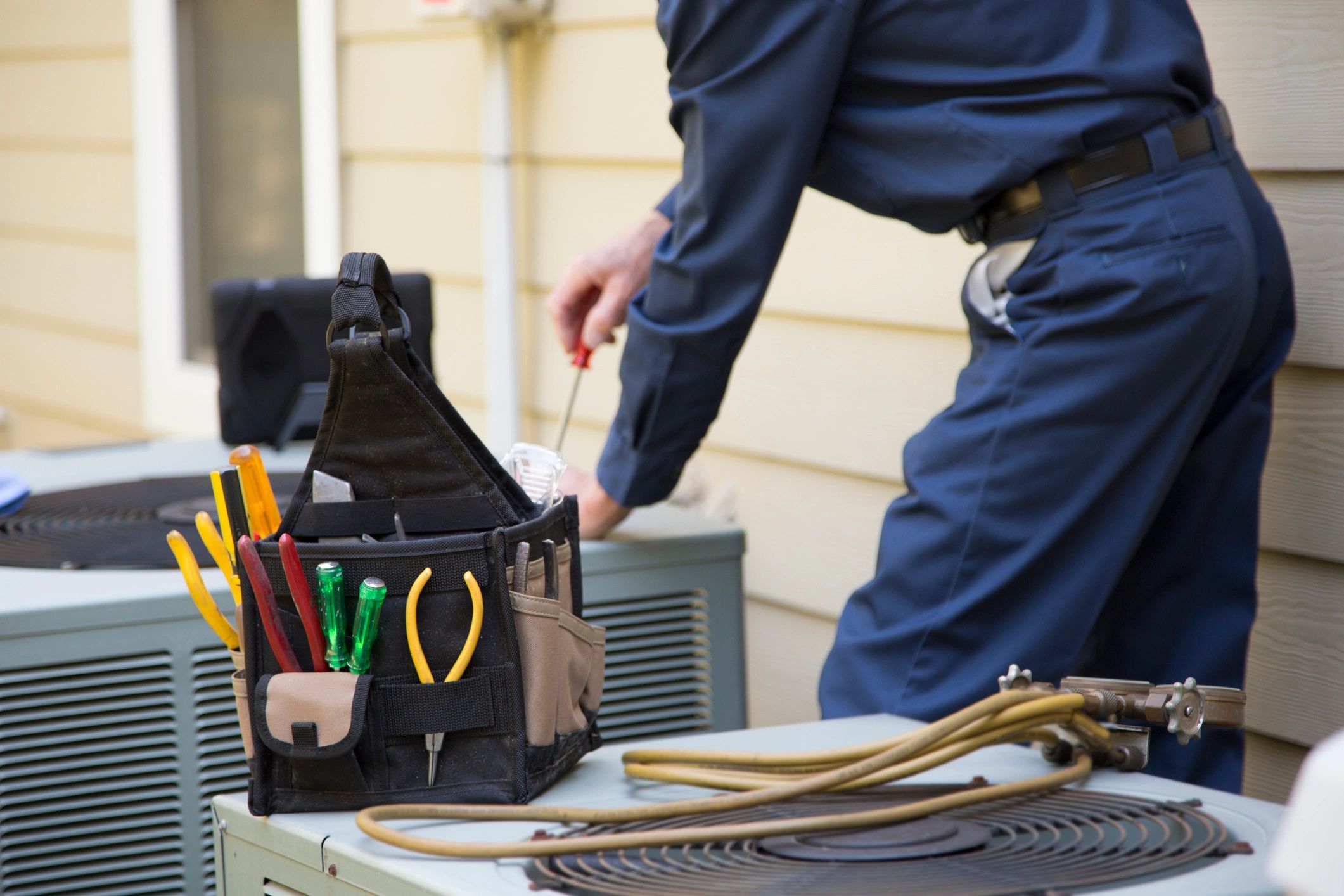 GMS Solutions technician performing equipment repair